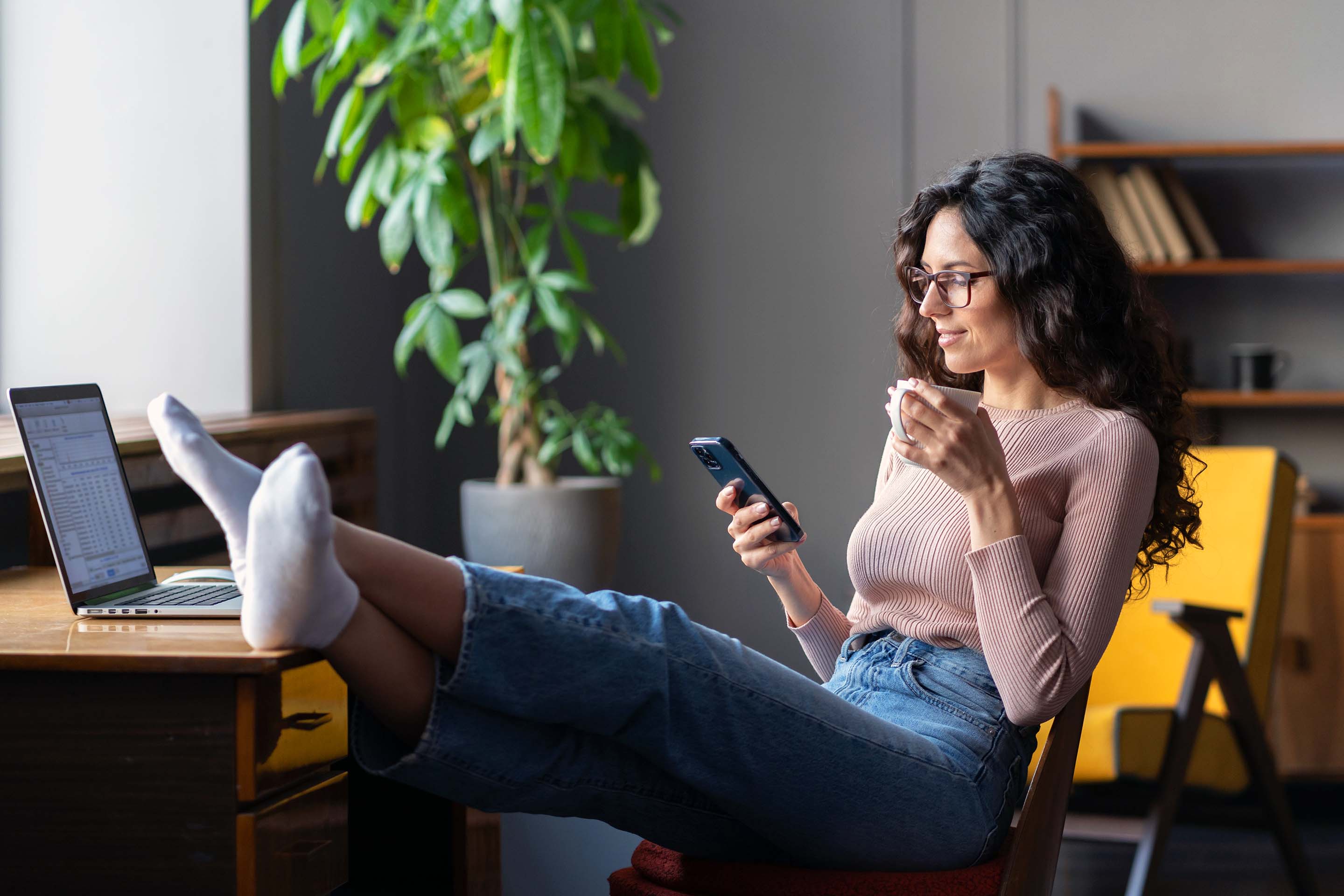 Recruiters, swiping through candidate profiles (the Tinder of recruitment), in a relaxed mood.